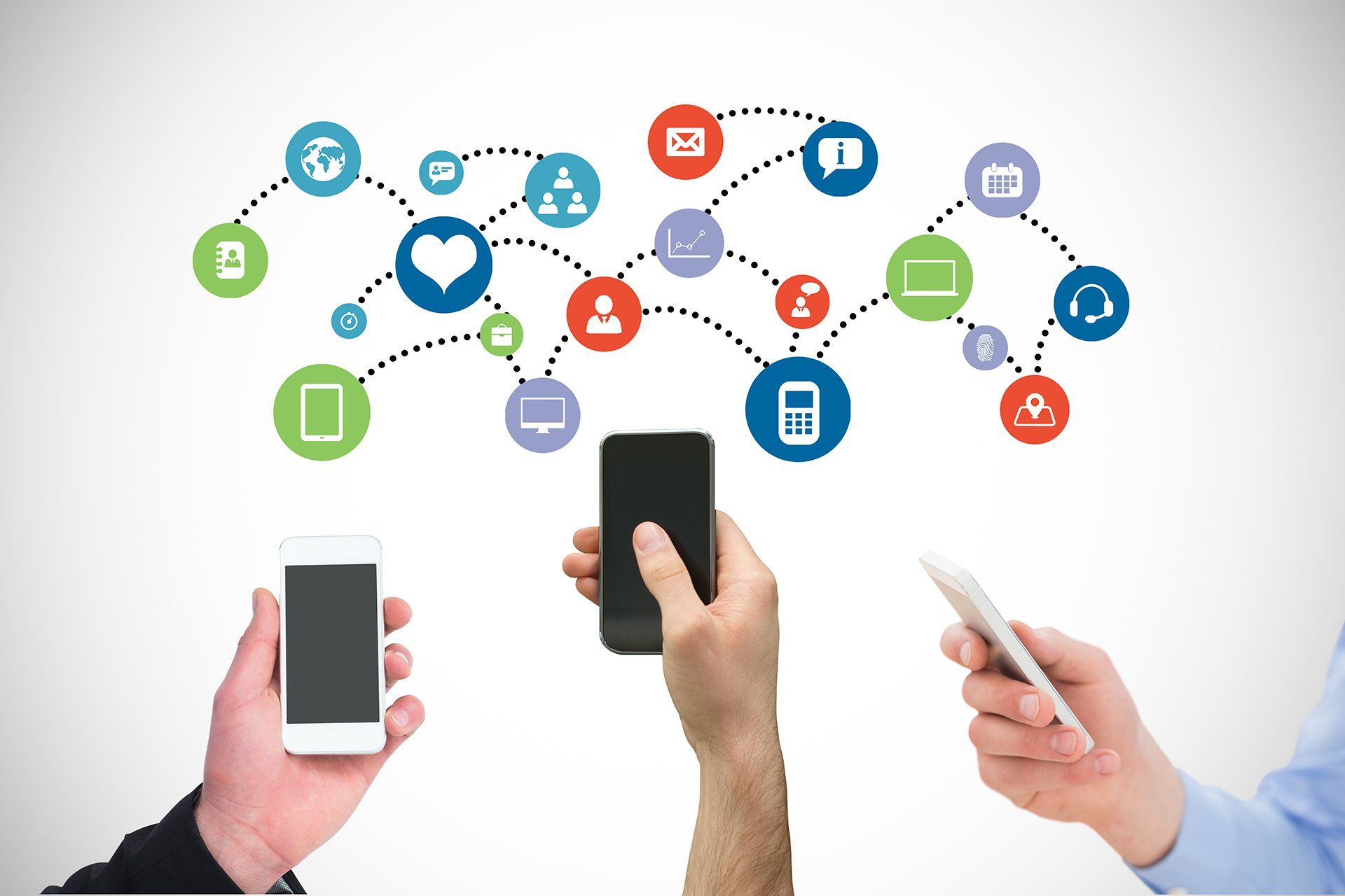 A group of people are holding cell phones in their hands.