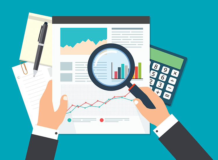 A person is holding a magnifying glass over a graph.
