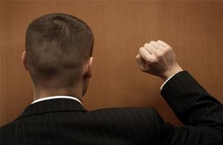 man knocking on the door