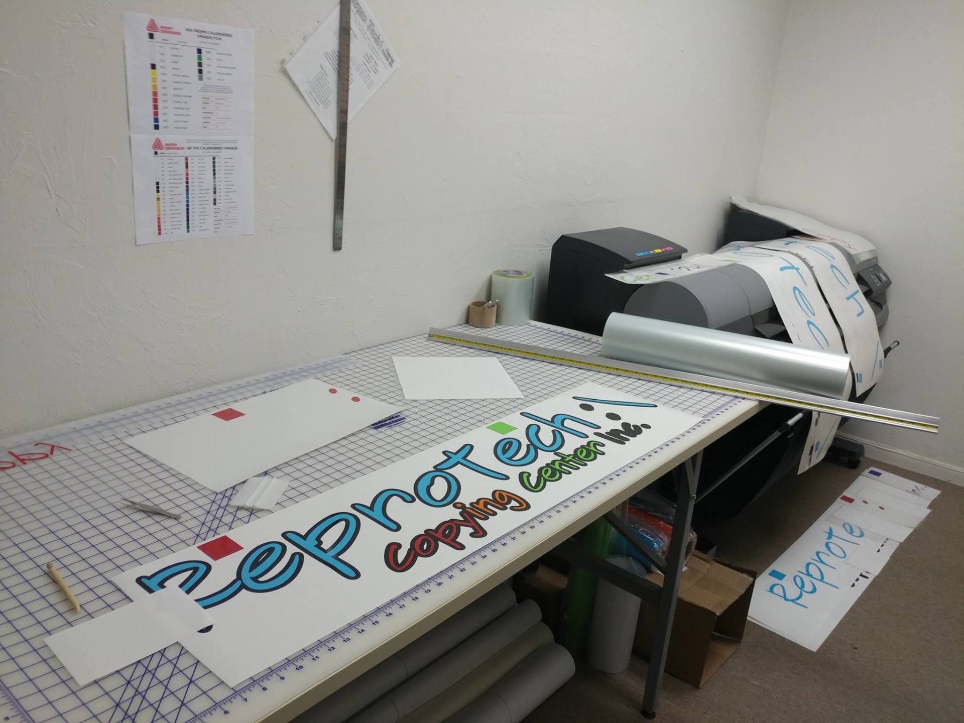 A work table with a sign that reads 