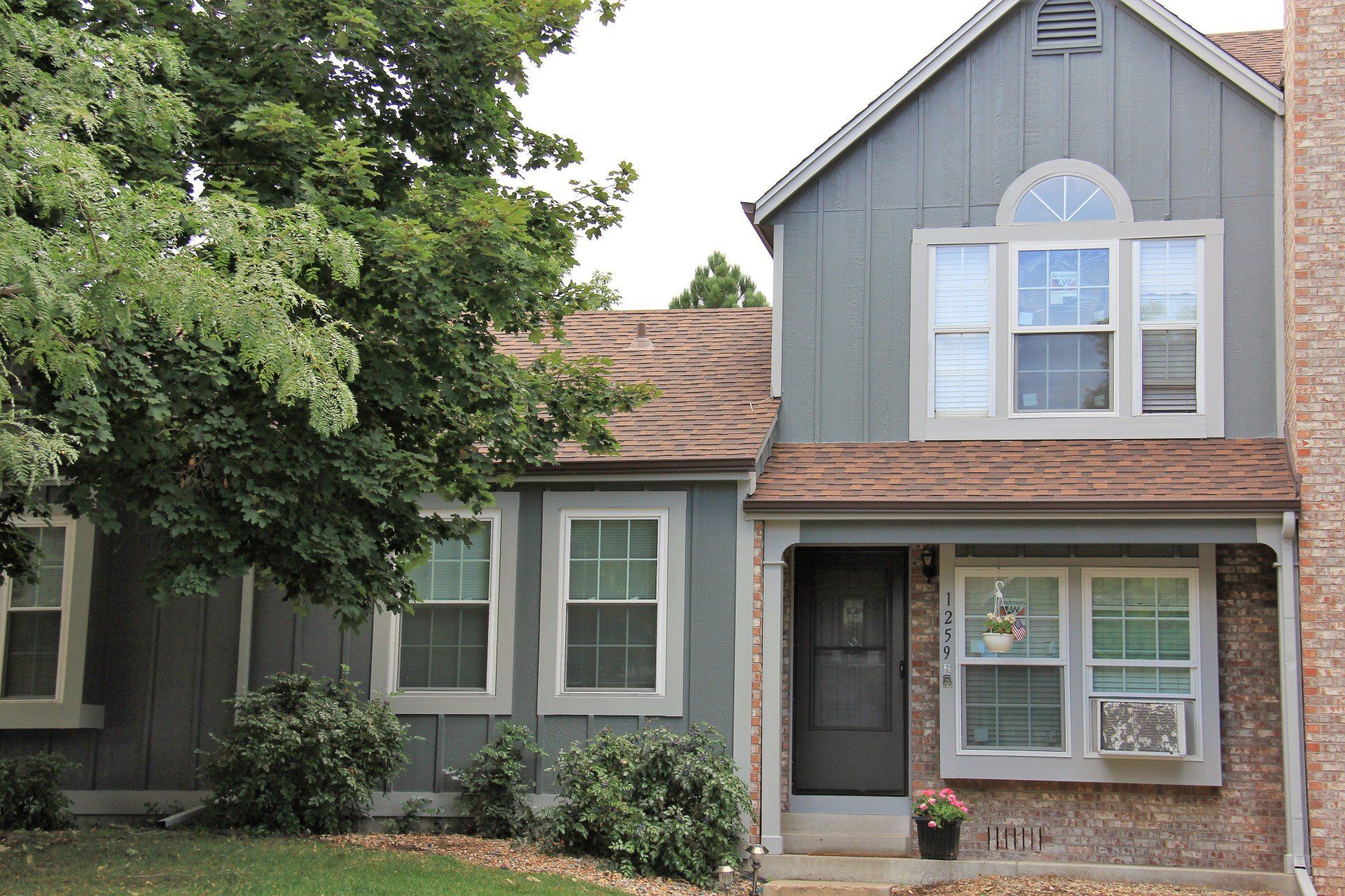Andersen windows have been recently installed in this two-story residence.