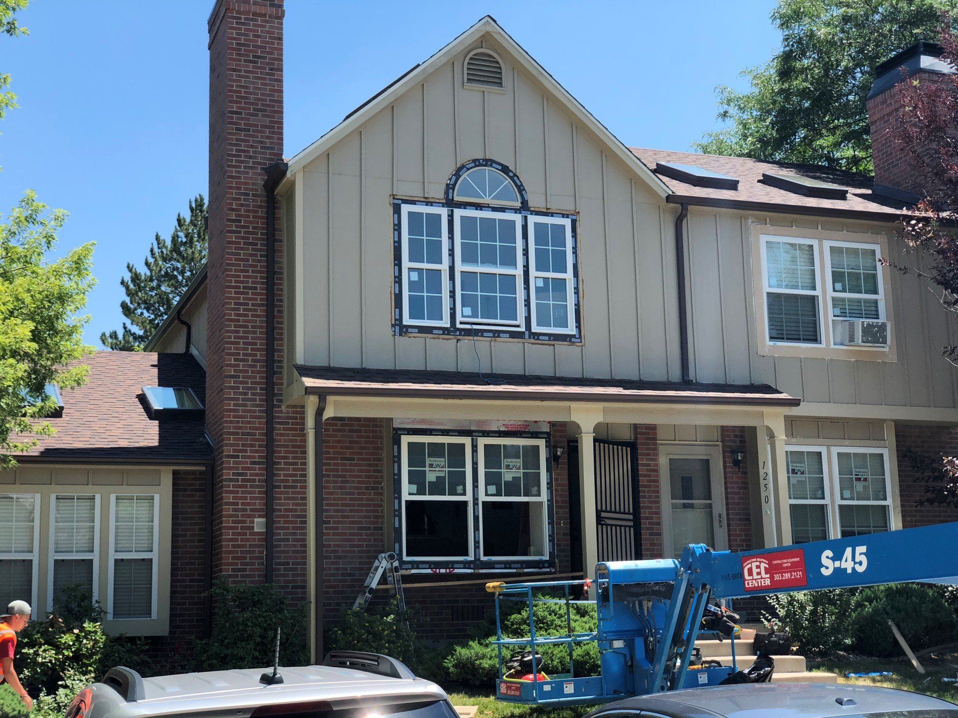 Windows are being installed on a multi-family complex,