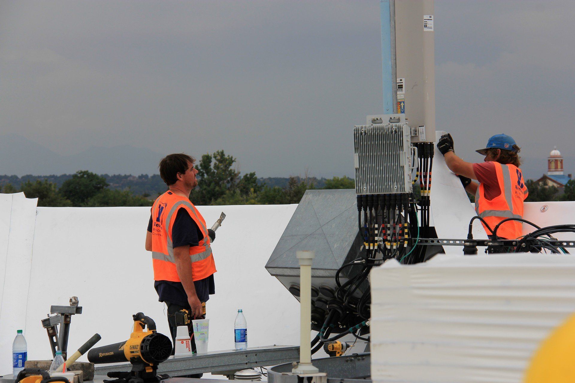 A commercial flat roof being installed.