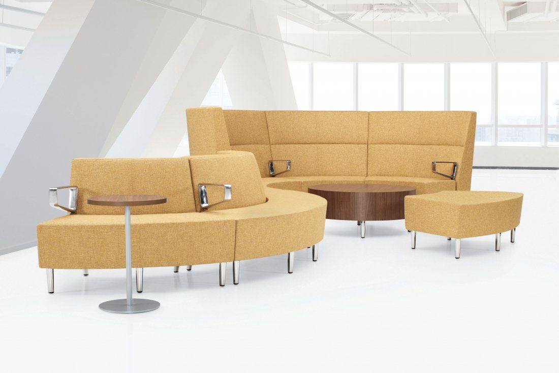 Yellow office lounge seating set: curved sofa, high-back couch, ottoman, and small table with metal legs.
