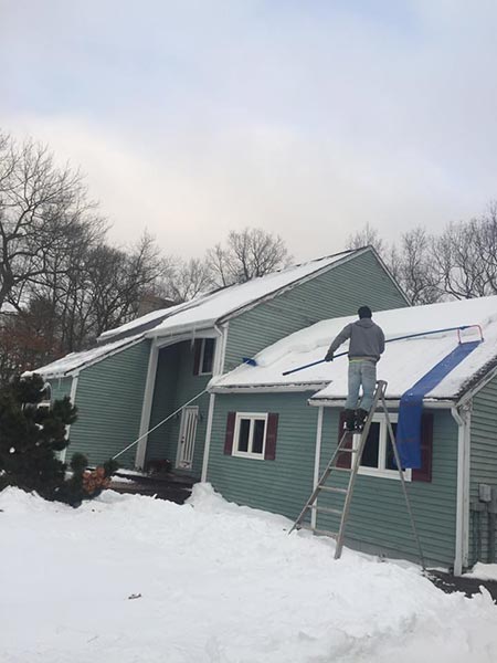 Removing ice in house — Power Washing Services in New Galilee, PA