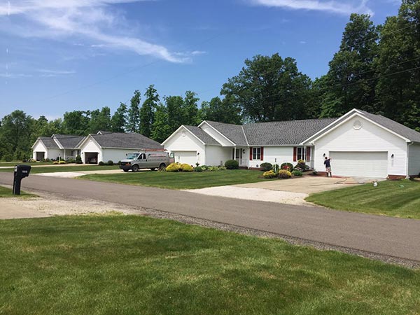 Clear long white house — Power Washing Services in New Galilee, PA