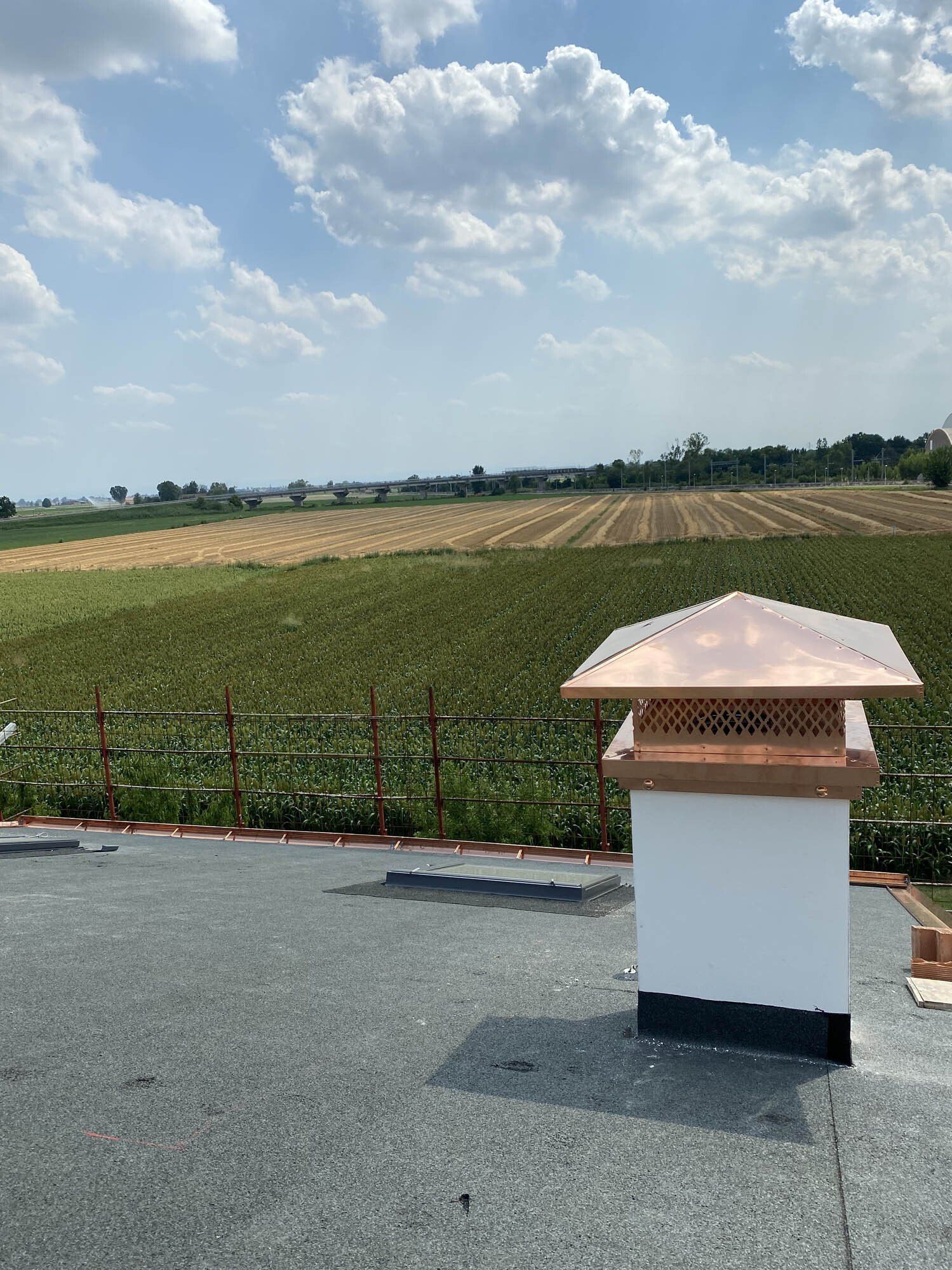 cappello camino in rame
