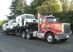 Big Truck with Container — Seattle, WA — Gary's Westside Towing Big Truck with Container — Seattle, WA — Gary's Westside Towing