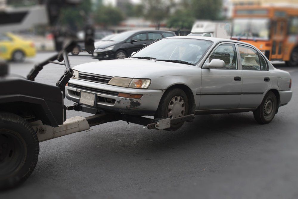 Towing an Illegal Parked Car — Seattle, WA — Gary's Westside Towing Towing an Illegal Parked Car — Seattle, WA — Gary's Westside Towing