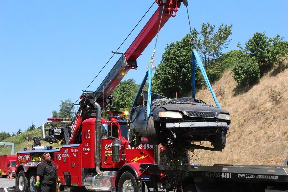 Damaged Car on the Truck — Seattle, WA — Gary's Westside Towing