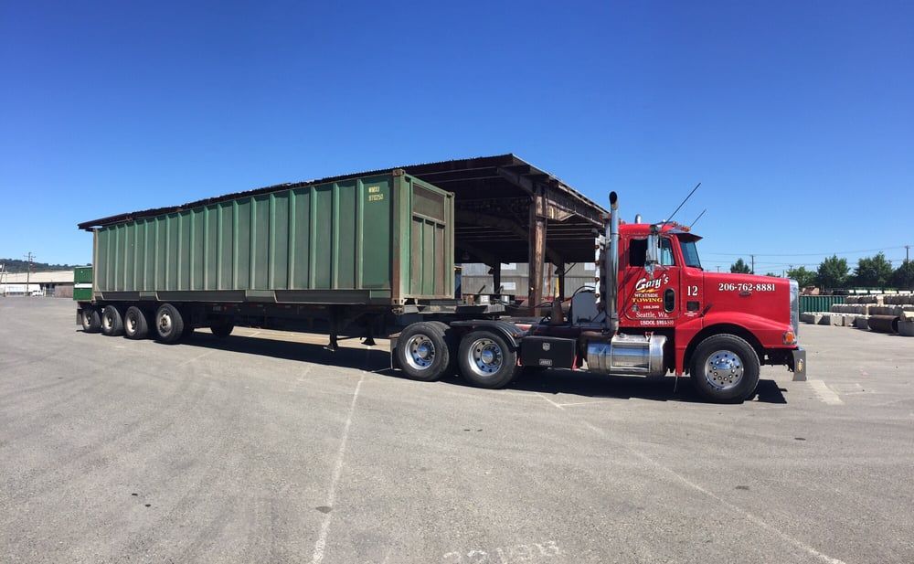 Big Truck with Container — Seattle, WA — Gary's Westside Towing
