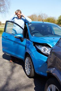Accidents — Man Calling for Assistance After Car Accident in Huntingtin Beach, CA