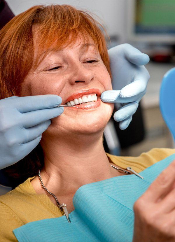 Senior Woman In The Dental Office — Cleveland, OH — Dr. Bradley Cohn, D.D.S. Senior Woman In The Dental Office — Cleveland, OH — Dr. Bradley Cohn, D.D.S.
