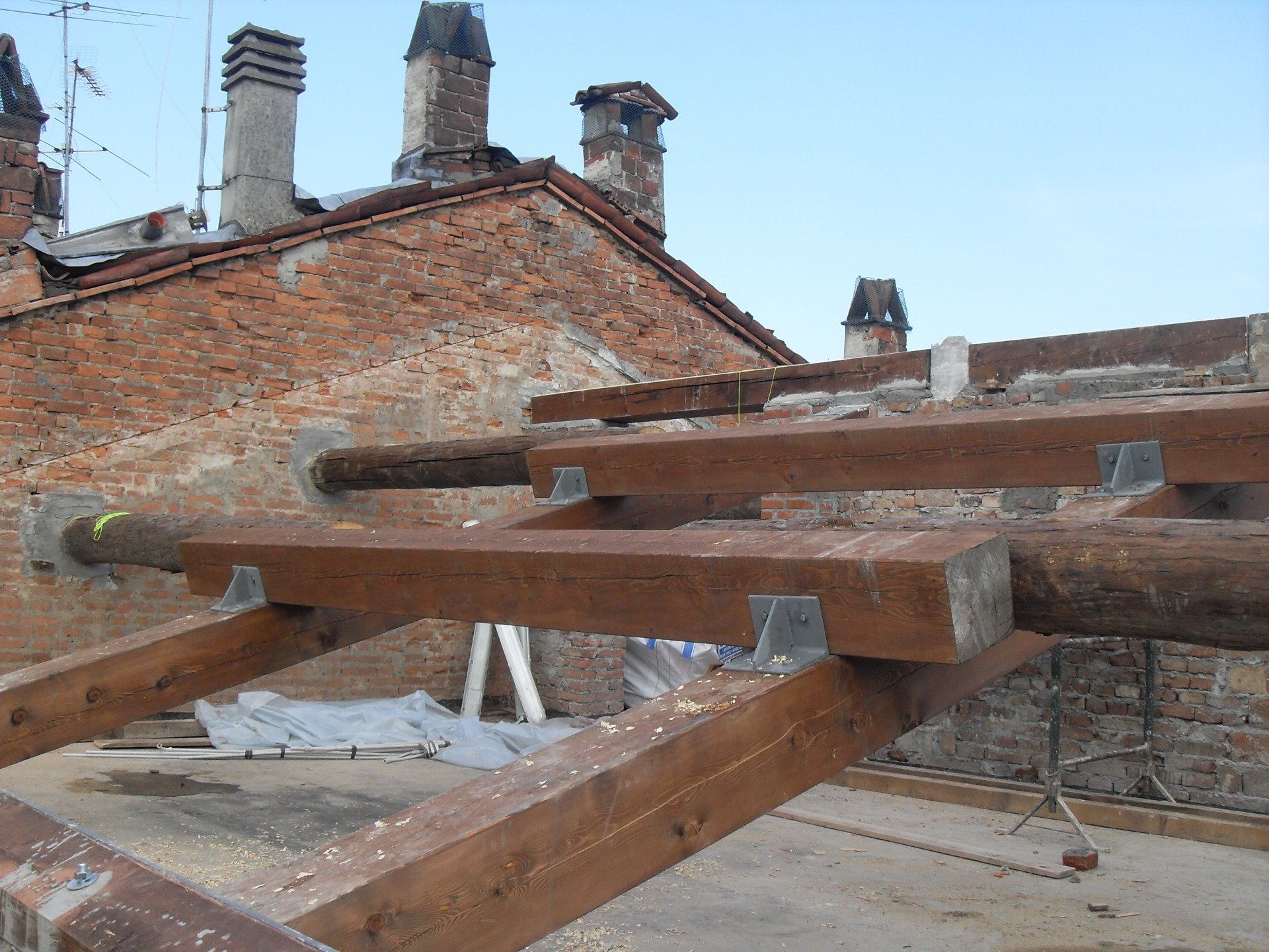 Replacing existing existing trezes with new wooden beams