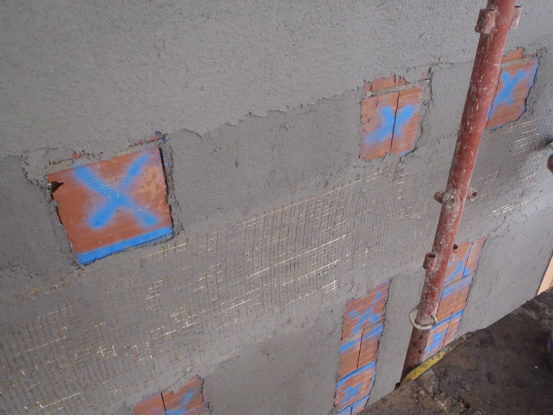 reinforcement of external tamponing priest with FRCM system fiber mesh installation