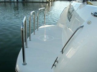 Swim platform with three staple rails by Tanner Manufacturing installed.