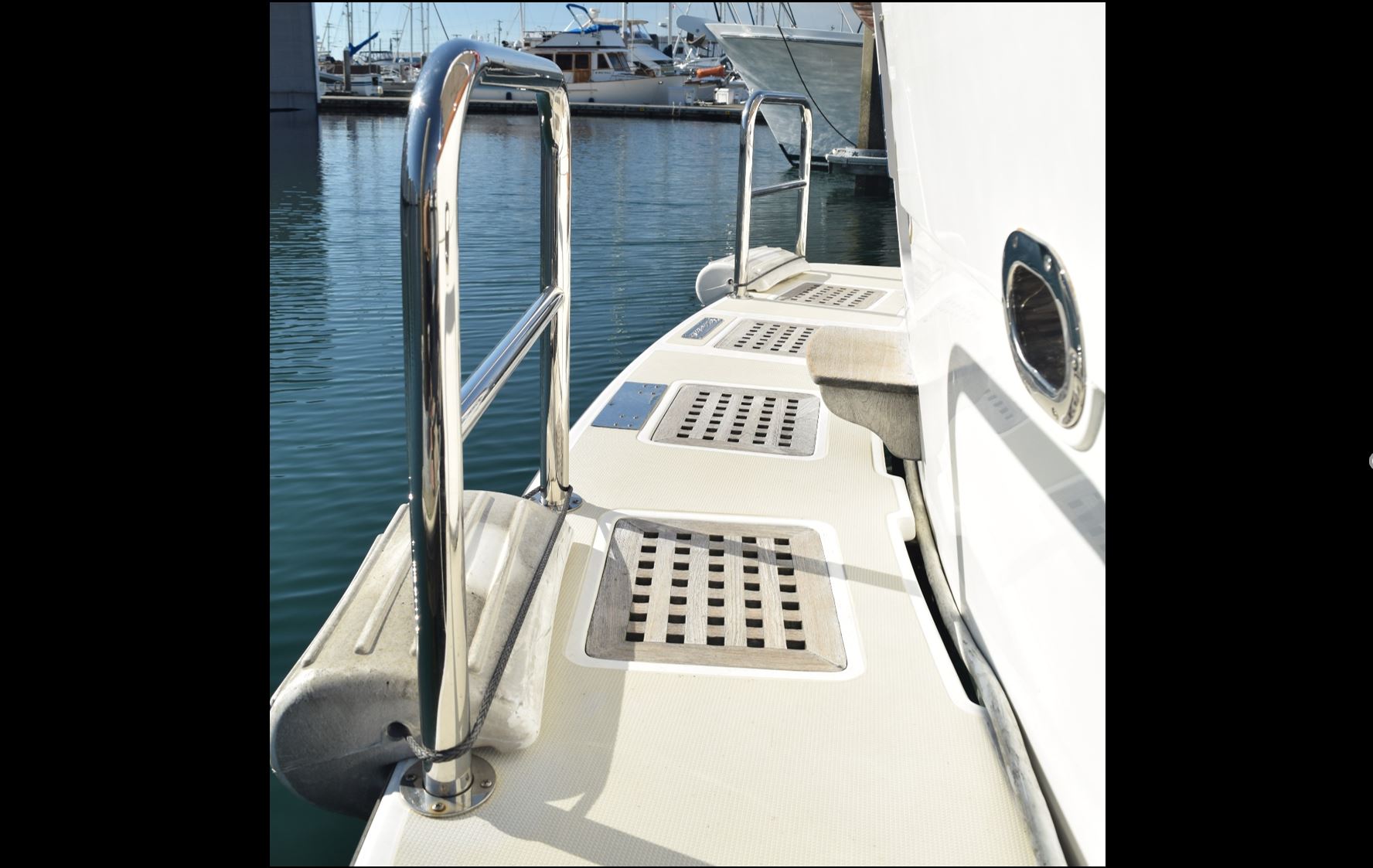 Two staple rails with crossmembers by Tanner Manufacturing installed on a swim platform. 