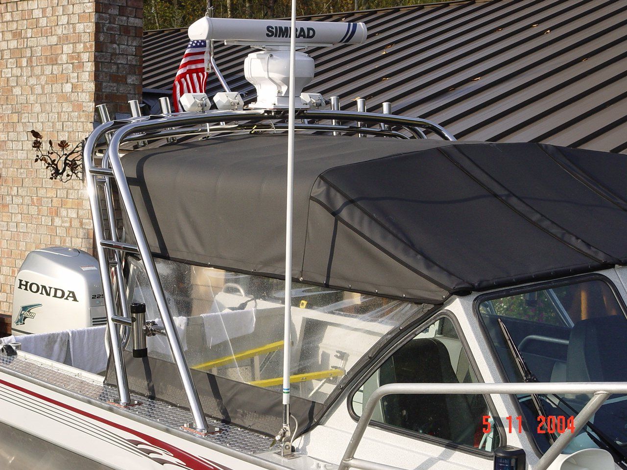 Custom stainless steel full-size radar arch with rod holders by Tanner Manufacturing. 