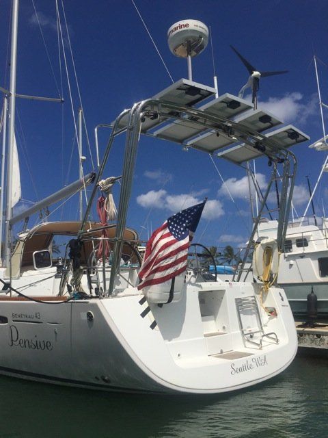 Stainless steel sailboat arch with solar panels by Tanner Manufacturing.