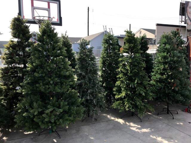 Green Christmas Tree with Tiny Yellow Christmas Lights — Holiday Items in Sacramento, CA