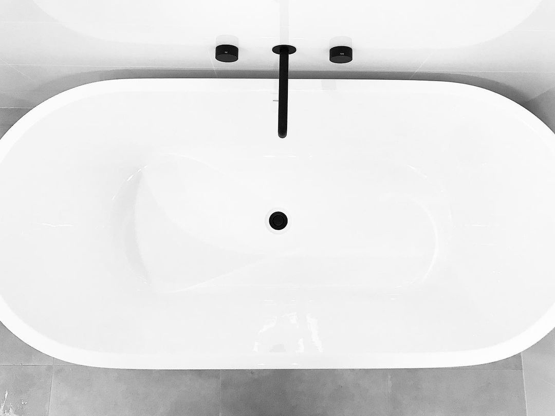 Bathroom team — Impact Bathrooms in Bateau Bay, NSW