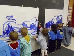 Kids Painting The Wall — Potomac, MD — Little Acorns Early Learning Center
