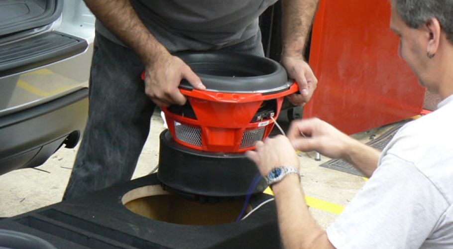 Car Audio — Electrician Installing  New Car Audio In Chicago, IL