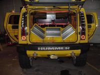 Auto Accessories — Luxury Yellow Car With Audio Speakers In Chicago, IL