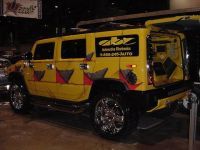 Custom Car Audio — Yellow Hummer With Customized Body Front View In Chicago, IL