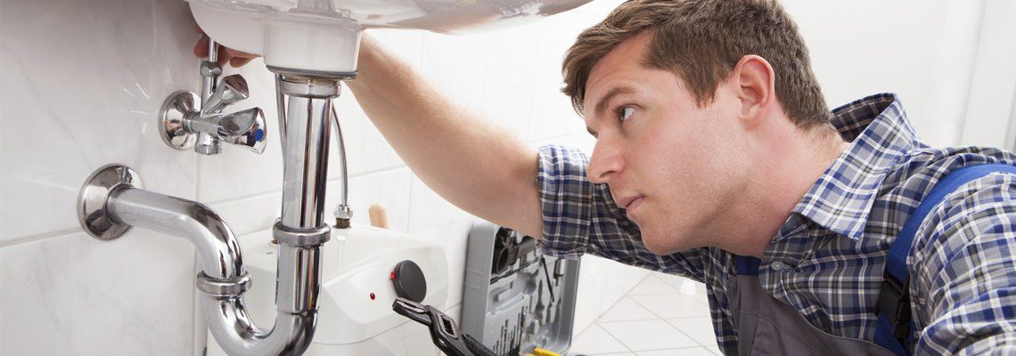 Plumber Fixing Sink - Dave's Cooling, Heating, & Plumbing Inc. - Staunton, VT Plumber Fixing Sink - Dave's Cooling, Heating, & Plumbing Inc. - Staunton, VT