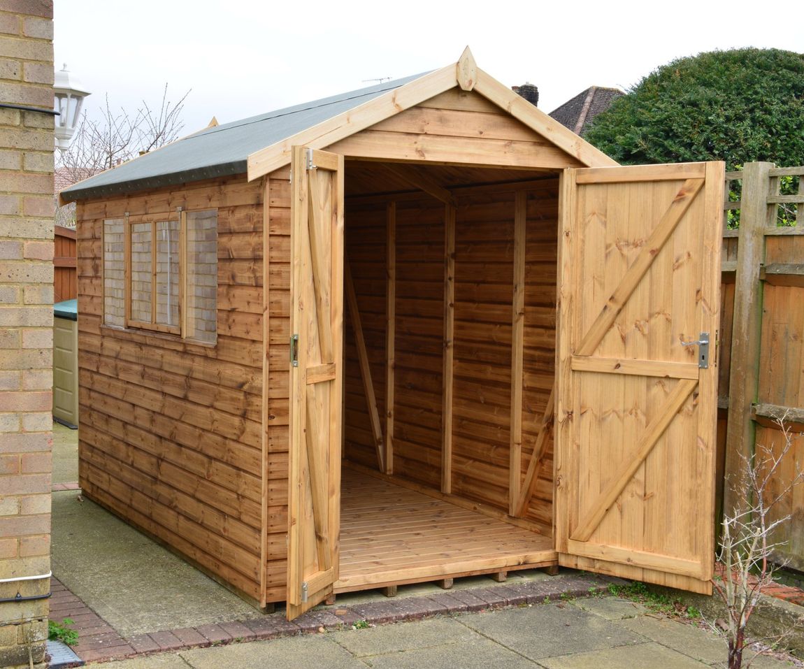 A small wooden shed with its doors open