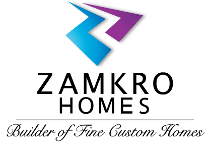 Logo for Zamkro Homes, featuring a blue and purple geometric icon above the text 