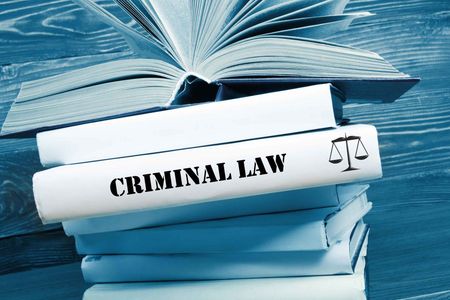 Criminal Law Book and Pen - Law Firm Serving in Cloquet, MN