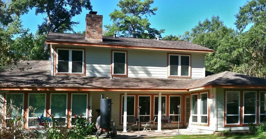 The back of the home with James Hardie Siding and Home Craftsmen windows.