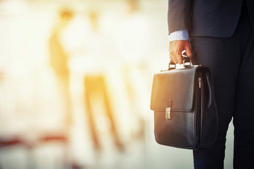 Attorney Holding His Bag ─ St. Joseph, Mi ─ Armstrong, Betker, & Schaeffer PLC