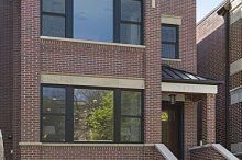 Three-story, brick building
