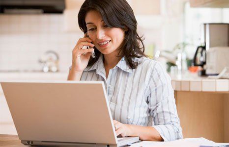 Happy lady customer speaking on phone