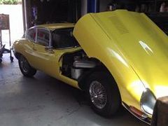 yellow car in the shop