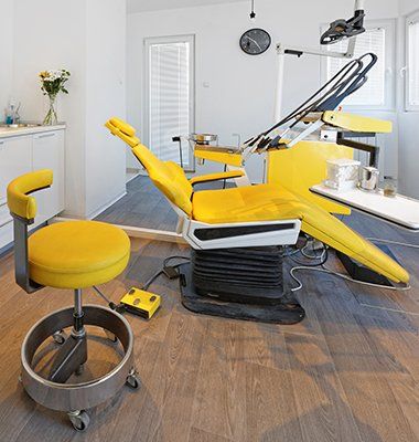 Yellow Dental Chair in Dentist Office Clinic — Port Angeles, WA — Design Craft Upholstery & Interiors Yellow Dental Chair in Dentist Office Clinic — Port Angeles, WA — Design Craft Upholstery & Interiors