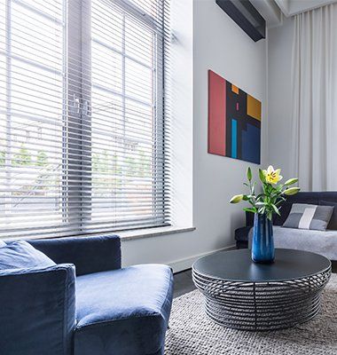 Living Room with Blue Upholstered Furniture — Port Angeles, WA — Design Craft Upholstery & Interiors Living Room with Blue Upholstered Furniture — Port Angeles, WA — Design Craft Upholstery & Interiors