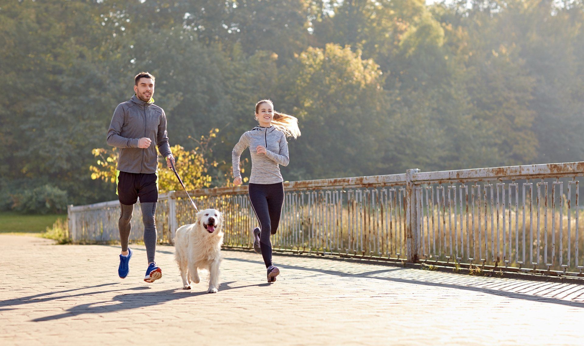 Couple Exercising with Dog — Goldsboro, NC — Eli's Friends