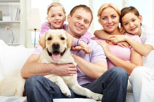 Family with their Dog — Goldsboro, NC — Eli's Friends Family with their Dog — Goldsboro, NC — Eli's Friends
