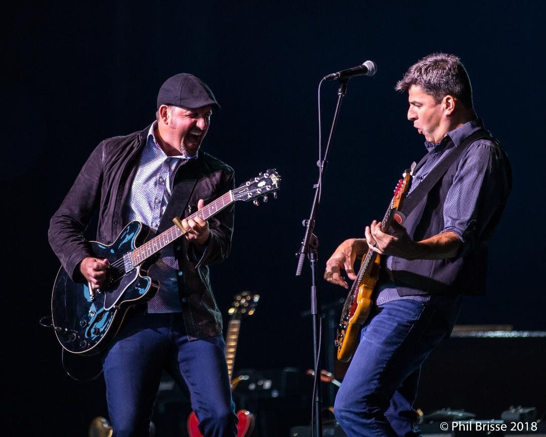 Steve Strongman and Colin Lapsley on stage with guitars on fire - well, not literally but you can imagine that the stings are hot from al that strumming!