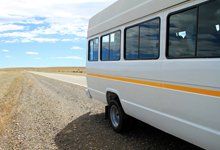 A side view of a mini bus