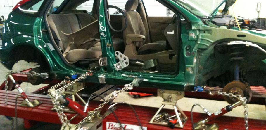 Auto Body Shop Machine. Three Pulls Out to the Side and Length Pulls on the Rocker.