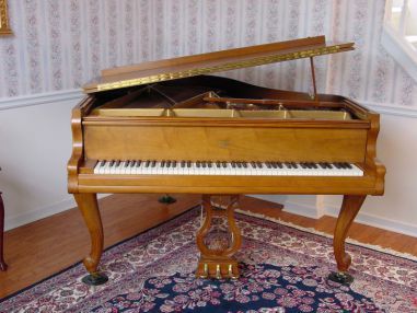 Rococo style grand piano Rococo style grand piano