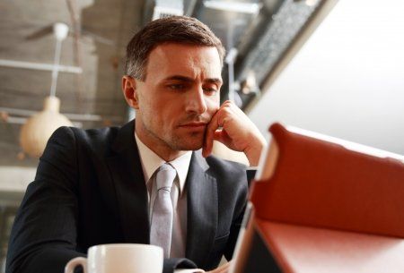 Man on suite with coffee