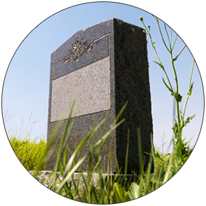 Headstone under blue sky—new york in Bronx, NY Headstone under blue sky—new york in Bronx, NY