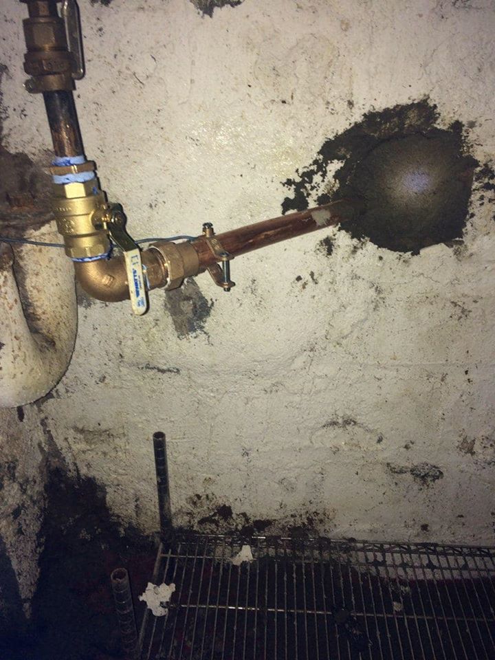 A close up of a pipe with a ball attached to it