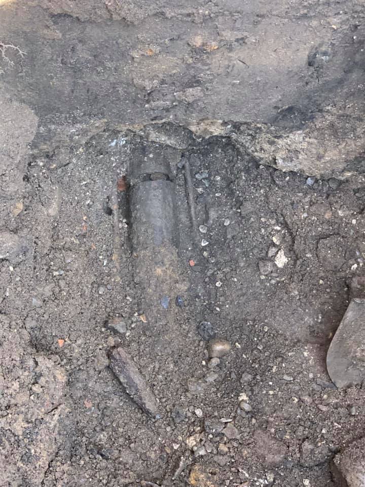 A close up of a footprint in the dirt.
